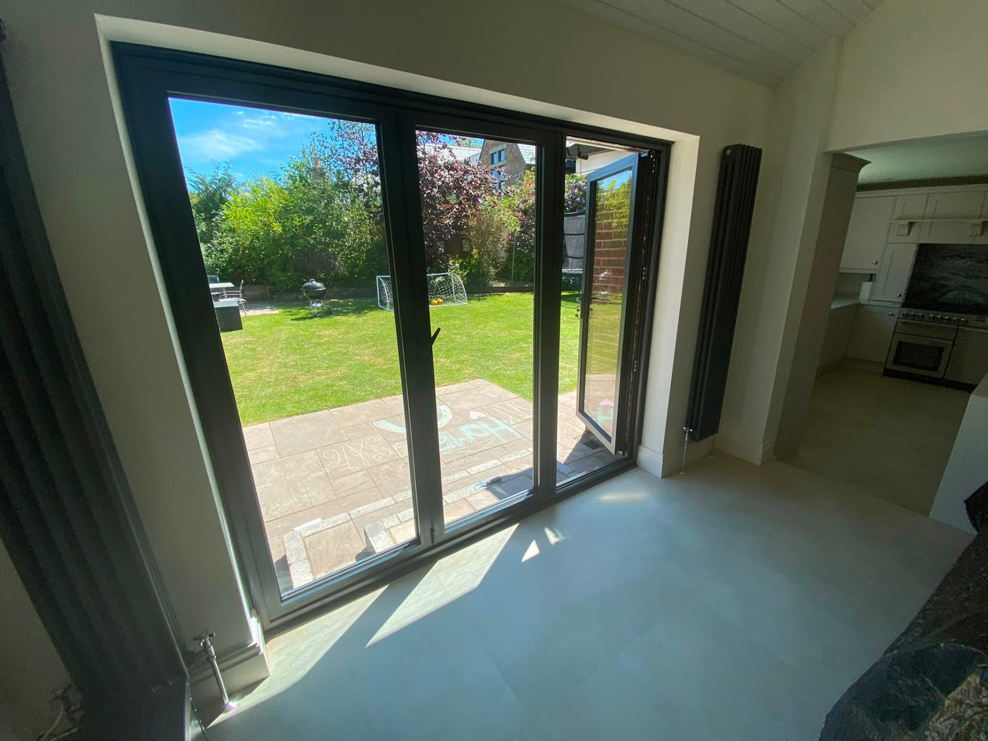 Aluminium bi-fold doors installation by Rural Windows in Chester & North Wales