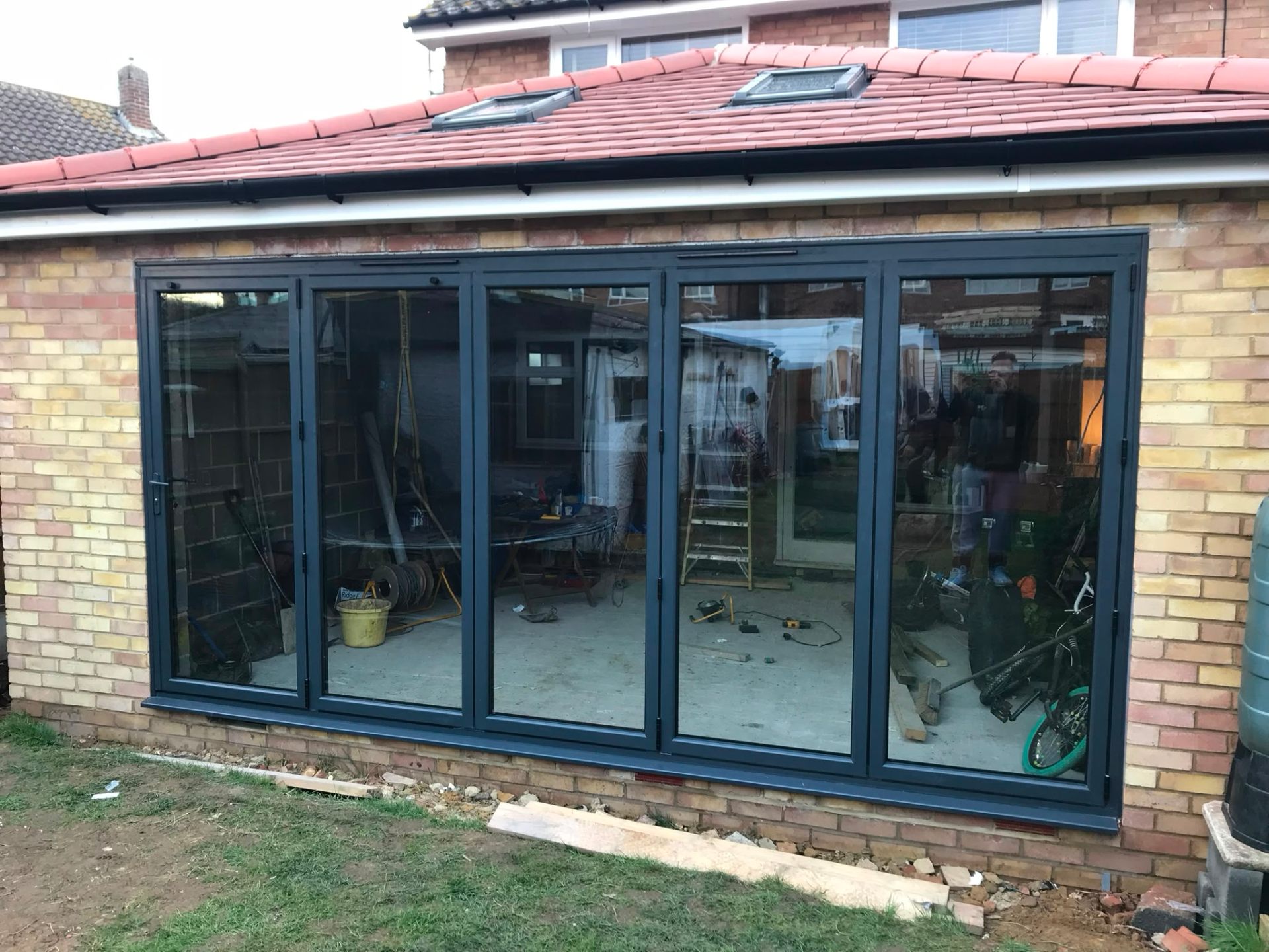 Aluminium bi-fold doors installation by Rural Windows in Chester & North Wales