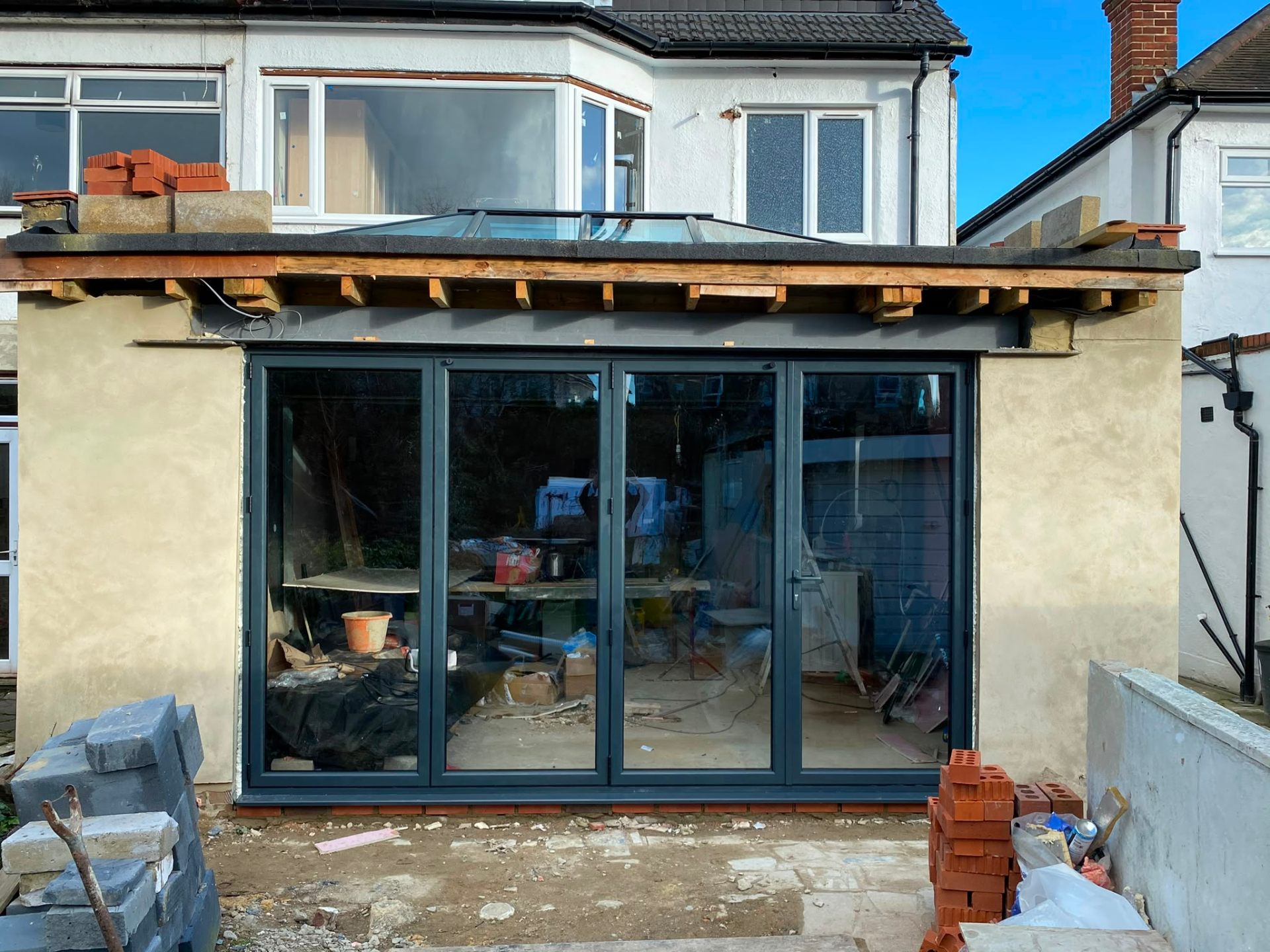 Aluminium bi-fold doors installation by Rural Windows in Chester & North Wales
